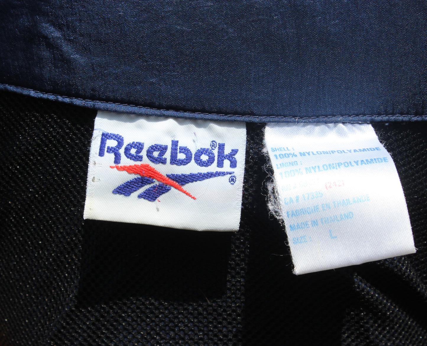 VINTAGE 90s | Reebok Center Logo Light Pullover Jacket | Size L