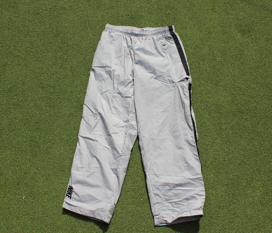 VINTAGE 00s | Nike Small Swoosh Downstripe Track Pants | Size L